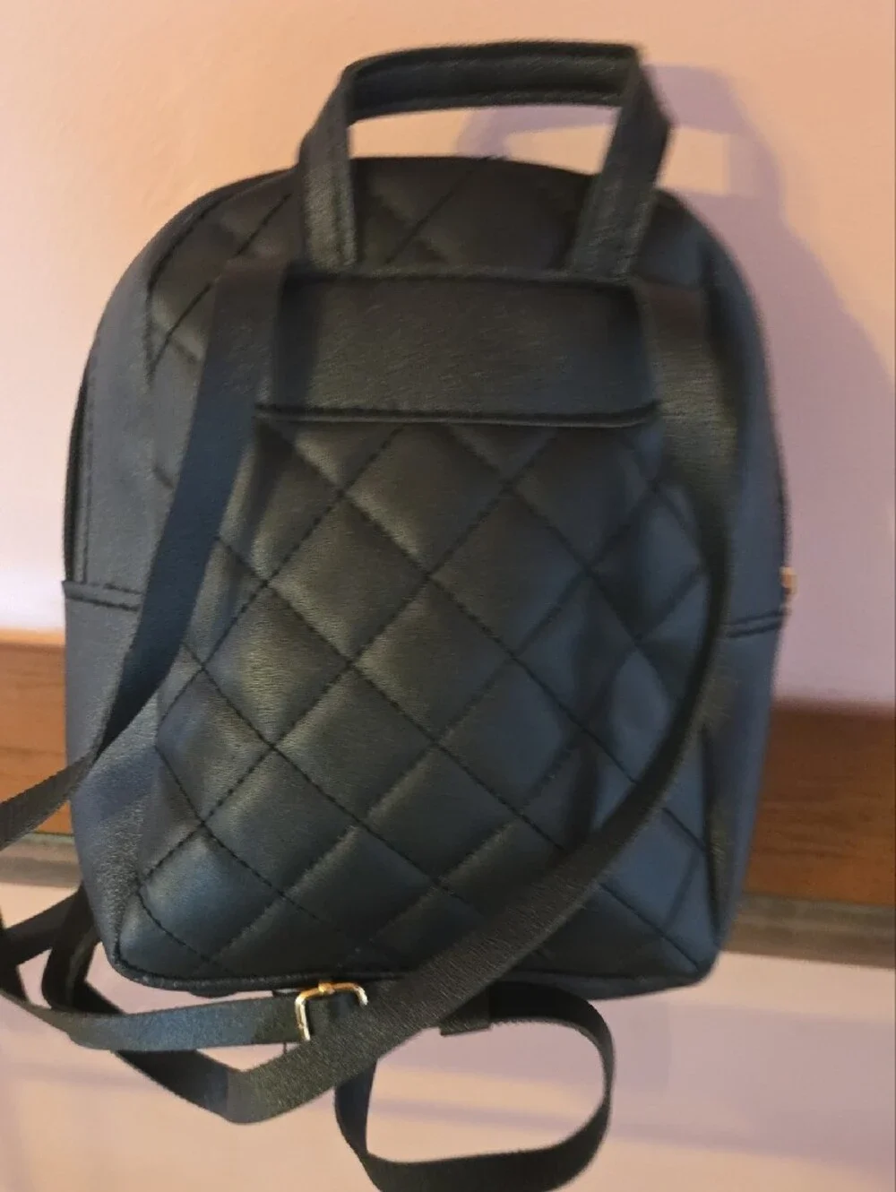 Quilted Black Mini Backpack with Gold Accent